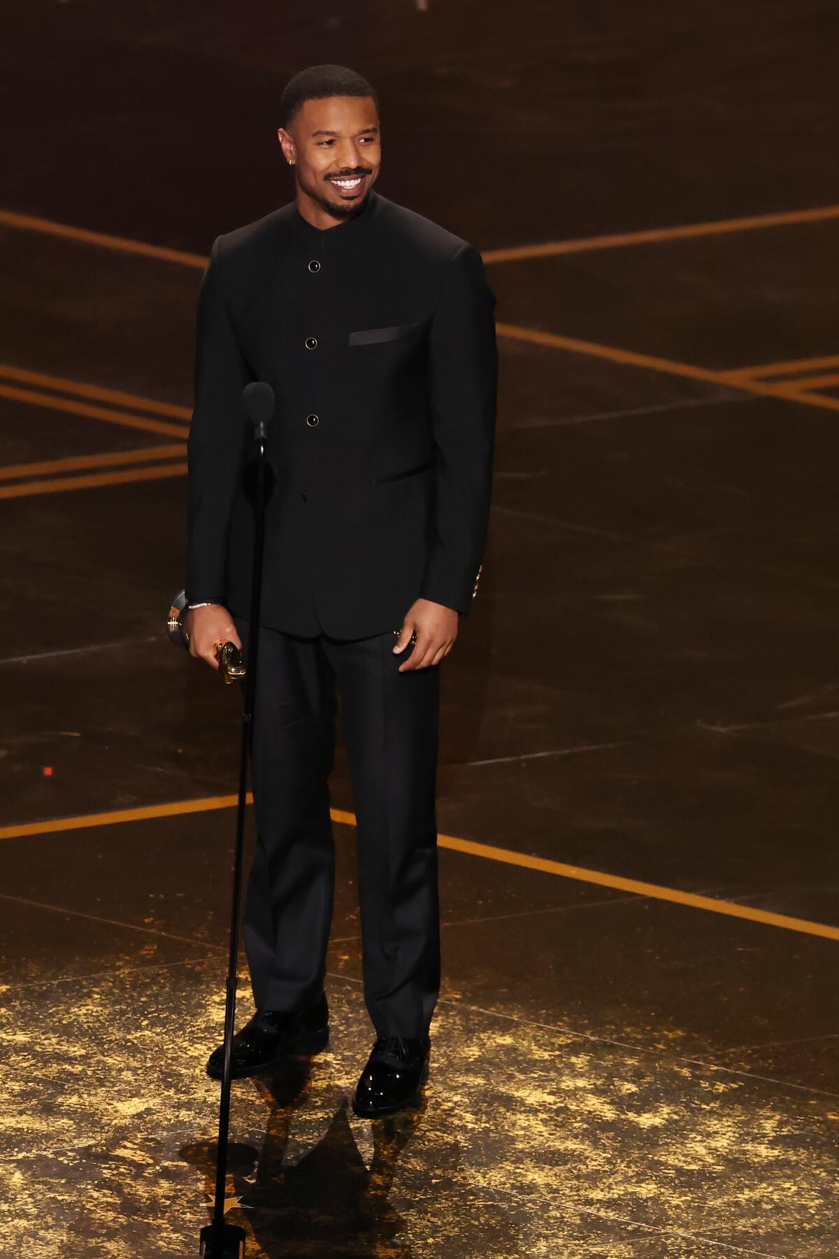 Michael B. Jordan accepts the Oscar for actor in a leading role for "Sinners."