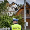 Polish police and military on Wednesday inspect damage to a house from the debris of a drone that was shot down in the village of Wyryki-Wola, eastern Poland. Poland says it shot down several Russian attack drones that violated Polish airspace in overnight Russian attacks on neighboring Ukraine.