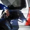 A customer fuels up his car in Linden, New Jersey, on March 18, 2026.