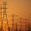 A view of high voltage transmission towers in Houston, Texas. Millions of Texans lost their power when winter storm Uri hit the state and knocked out coal, natural gas and nuclear plants that were unprepared for the freezing temperatures brought on by the storm. Wind turbines that provide an estimated 24 percent of energy to the state became inoperable when they froze. (Photo by Justin Sullivan/Getty Images)