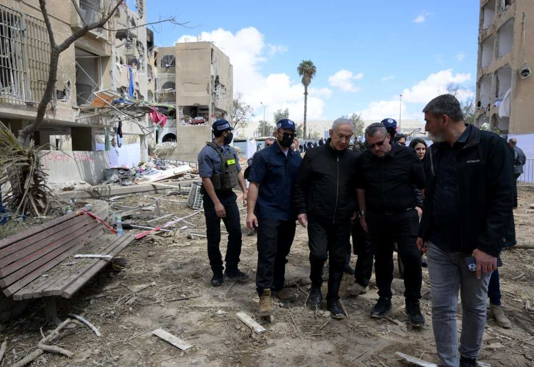 Israeli Prime Minister Benjamin Netanyahu inspects damage at a site hit by a missile during an Iranian retaliatory attack in Arad, Israel, on Sunday.