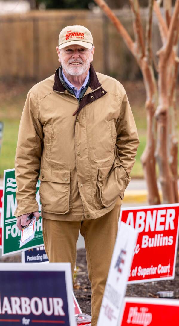 Phil Berger, candidate for North Carolina State Senate, campaigns at Douglass Elementary in Eden, N.C., on Tuesday, March 3, 2026. (Woody Marshall/News & Record via AP)