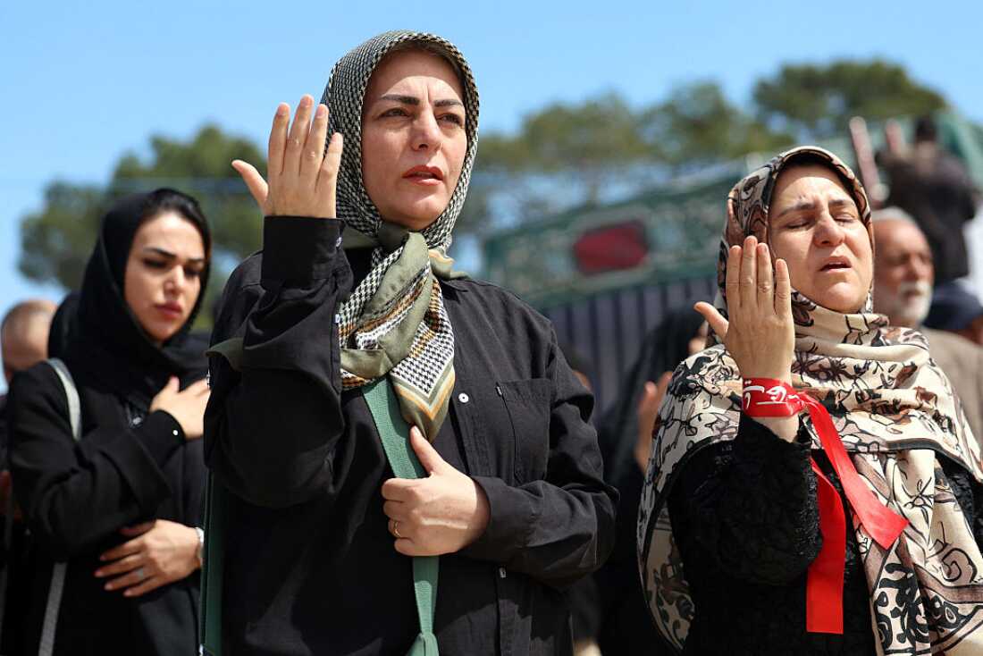 Iranian women mourn during a funeral for victims of the Middle East war at the Behesht Zahra cemetery in southern Tehran on March 26, 2026.