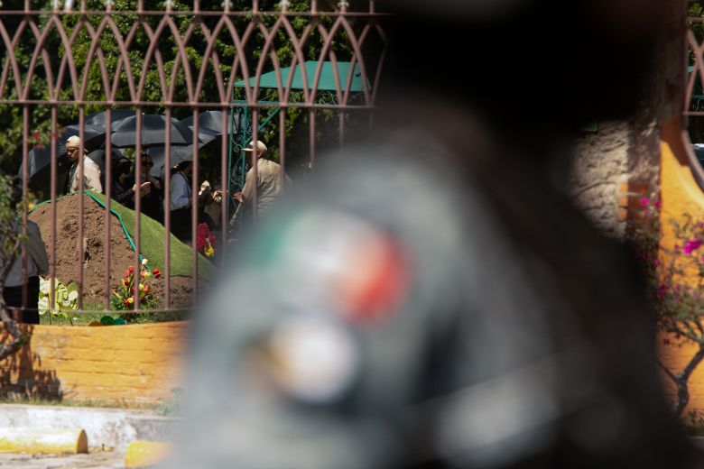 A member of Mexico's security forces stands outside the Recinto de la Paz cemetery in Zapopan, Mexico, on March 2, 2026.