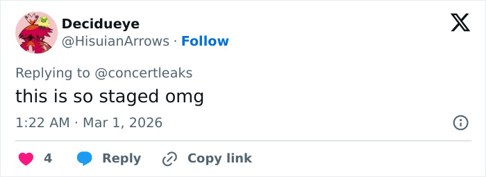 Twitter reply showing a user commenting on chaos at Brit Awards as singer gets pushed off stage mid performance. Twitter reply showing a user commenting on chaos at Brit Awards as singer gets pushed off stage mid performance.
