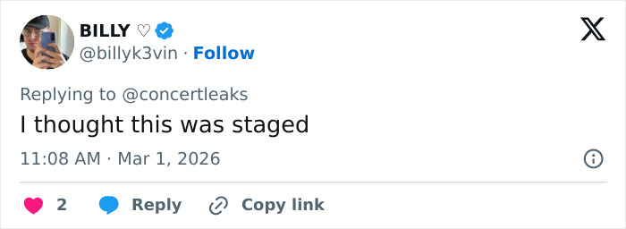 Tweet screenshot showing a user reacting to chaos at Brit Awards as singer gets pushed off stage mid performance in viral video. Tweet screenshot showing a user reacting to chaos at Brit Awards as singer gets pushed off stage mid performance in viral video.