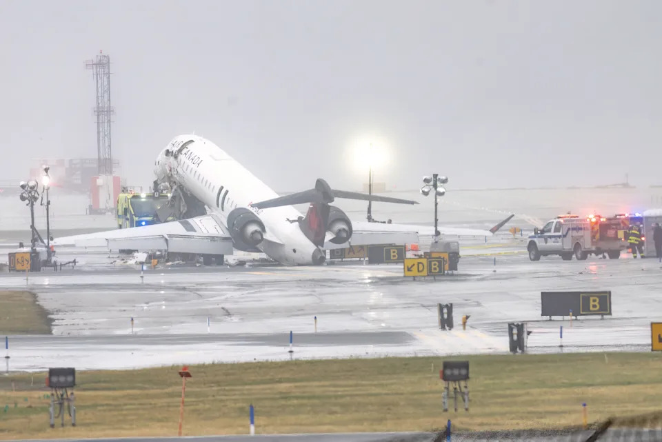 A view from the rear of the crashed Air Canada jet on the tarmac.
