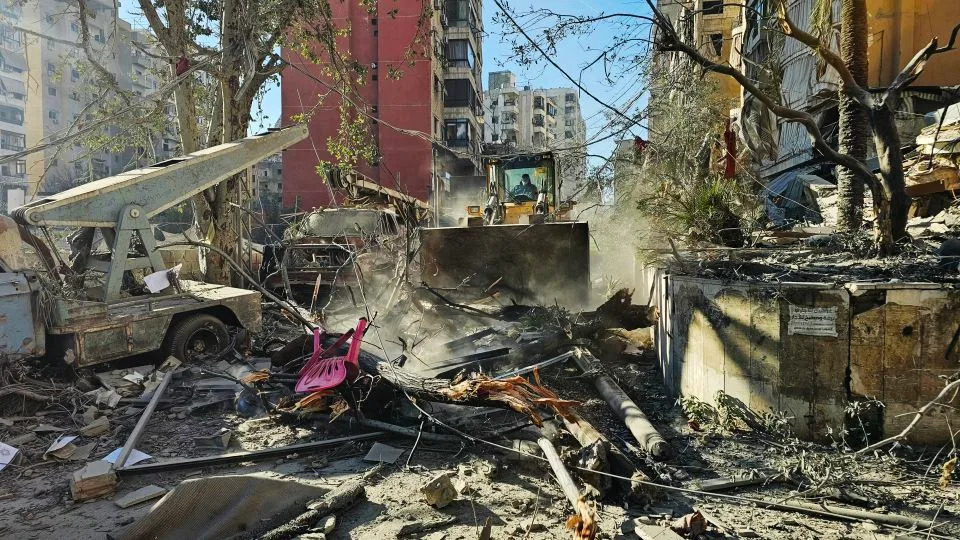 A bulldozer clears the debris of destroyed buildings at the site of an Israeli airstrike that targeted Rweiss neighbourhood in Beirut's southern suburbs, on March 8, 2026. - AFP/Getty Images