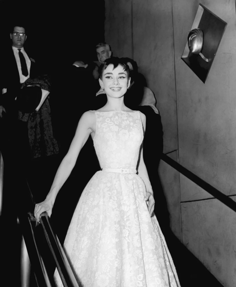 26TH ANNUAL ACADEMY AWARDS -- Pictured: Actress Audrey Hepburn, wearing a Givenchy gown, at the 26th Annual Academy Awards at the NBC Century Theatre in New York City, on March 25, 1954 (Photo by NBCU Photo Bank/NBCUniversal via Getty Images via Getty Images)
