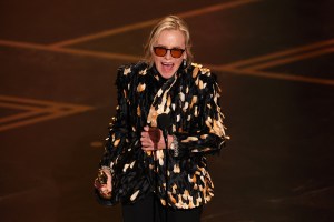 US actress Amy Madigan accepts her Best Actress in a Supporting Role for "Weapons" onstage during the 98th Annual Academy Awards at the Dolby Theatre in Hollywood, California on March 15, 2026. (Photo by Patrick T. Fallon / AFP via Getty Images)