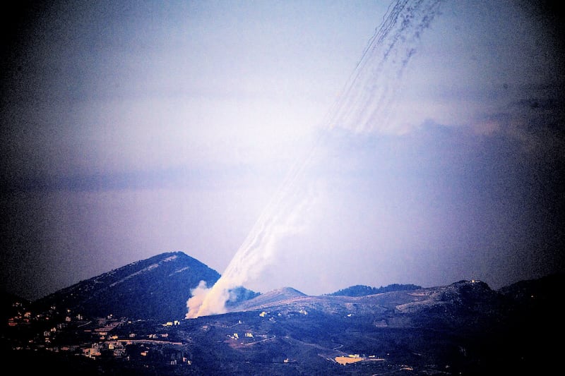 Rockets being launched from Lebanon towards Israel as seen from the Israeli side of the border with Lebanon.