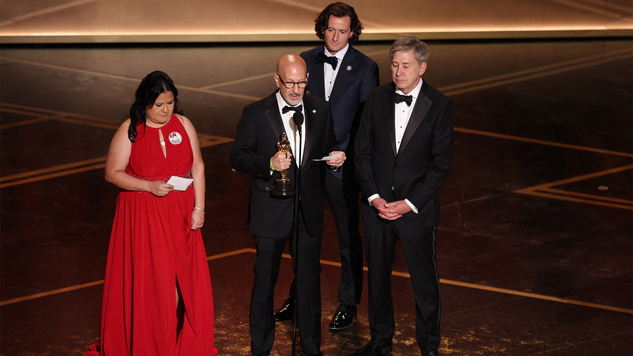 From left: Gloria Cazales, mother of Uvalde shooting victim, stands alongside US film director Joshua Seftel, Irish director Conall Jones and US broadcaster Steve Hartman as they accept the award for Best Documentary Short Film for "All The Empty Rooms" onstage during the 98th Annual Academy Awards at the Dolby Theatre in Hollywood, California on March 15, 2026.