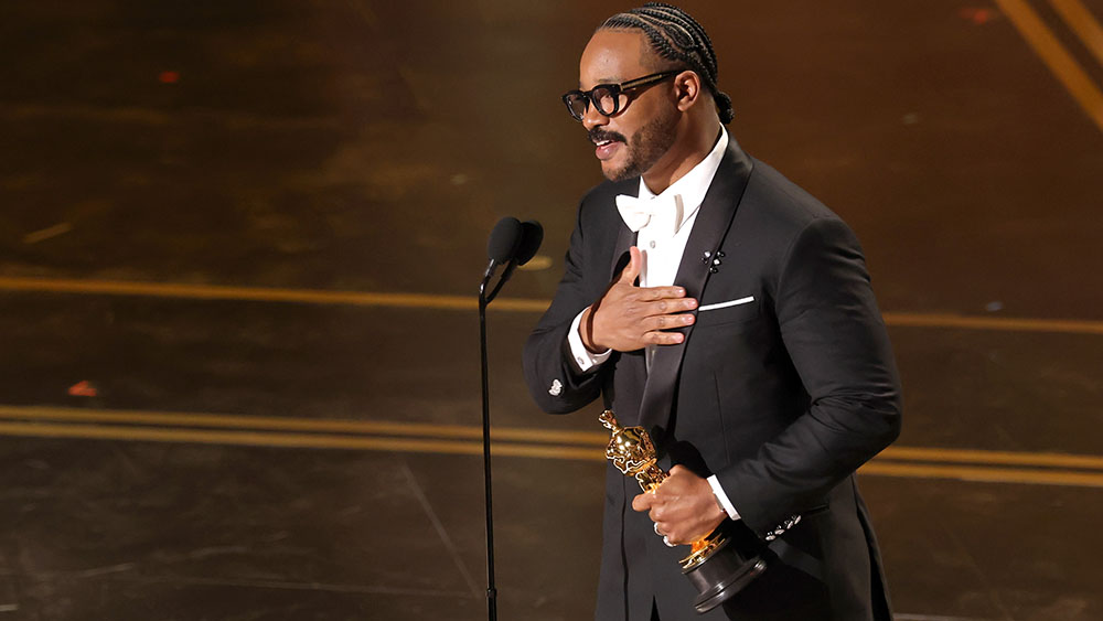 Ryan Coogler accepts the Writing (Original Screenplay) award for "Sinners" onstage during the 98th Oscars at Dolby Theatre on March 15, 2026 in Hollywood, California.