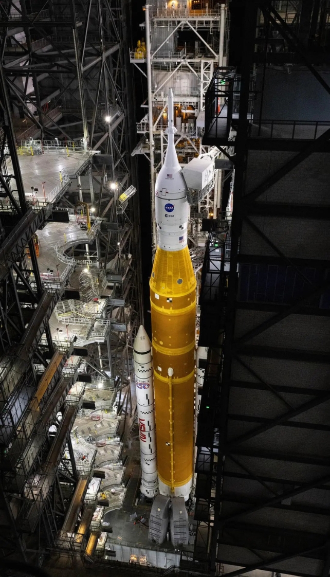 A top down view of a NASA rocket on a transporter