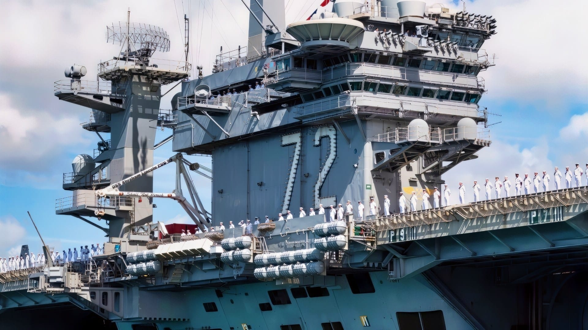 (June 28, 2022) – Nimitz-class aircraft carrier USS Abraham Lincoln (CVN 72) arrives at Joint Base Pearl Harbor-Hickam to participate in Rim of the Pacific (RIMPAC) 2022, June 28. Twenty-six nations, 38 ships, four submarines, more than 170 aircraft and 25,000 personnel are participating in RIMPAC from June 29 to Aug. 4 in and around the Hawaiian Islands and Southern California. The world’s largest international maritime exercise, RIMPAC provides a unique training opportunity while fostering and sustaining cooperative relationships among participants critical to ensuring the safety of sea lanes and security on the world’s oceans. RIMPAC 2022 is the 28th exercise in the series that began in 1971. (U.S. Navy photo by Mass Communication Specialist 1st Class Devin M. Langer)