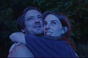 Lewis Pullman and Maya Hawke in WISHFUL THINGING