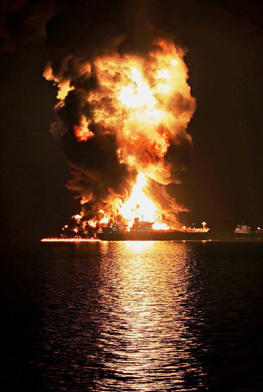 An oil tanker burns after being hit by an Iranian strike in the ship-to-ship transfer zone at Khor al-Zubair port near Basra, Iraq, on March 11.