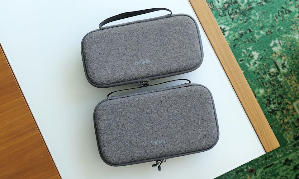 The Pro Charging Case (bottom) is a touch bigger and heavier than the previous model, but aside from that its sports a nearly identical design.