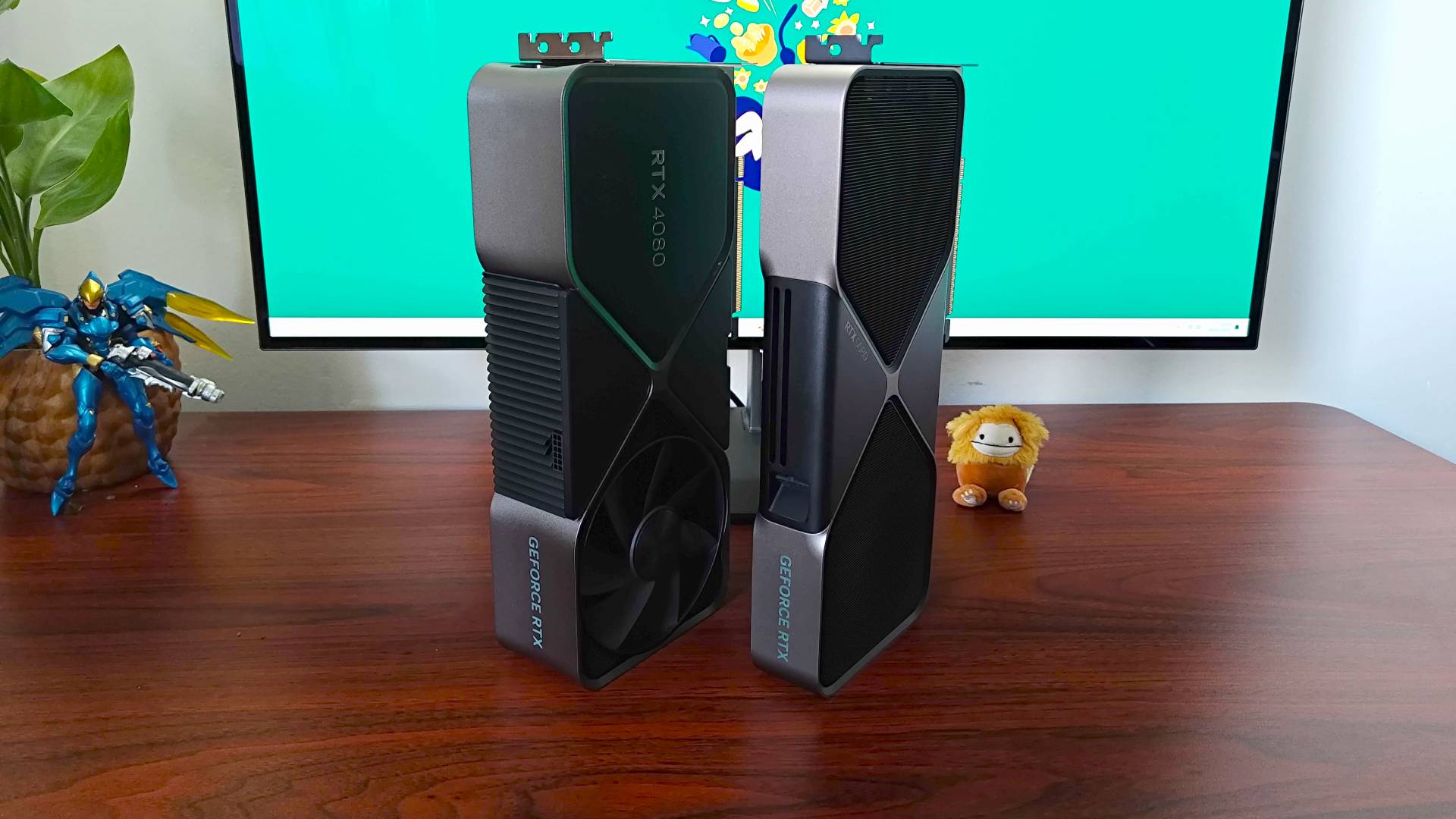 Nvidia GeForce RTX 5080 next to original RTX 4080 standing upright