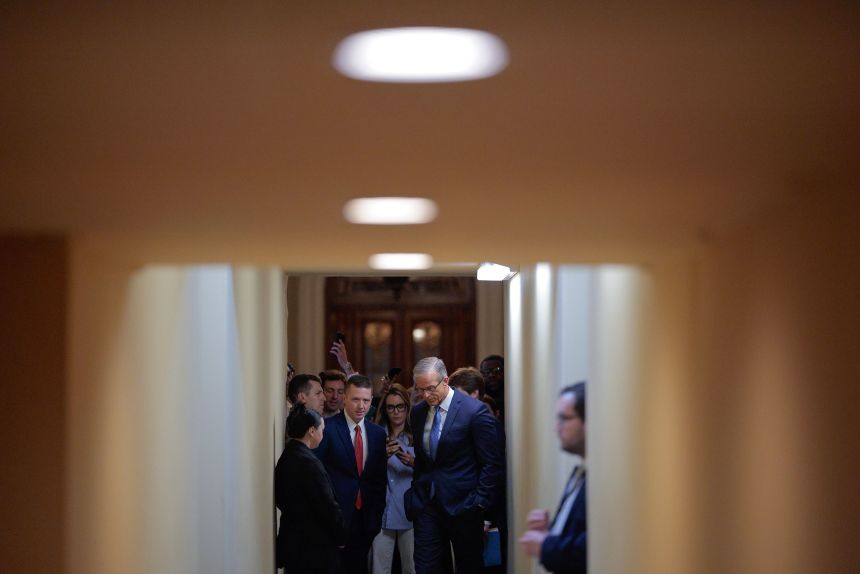 Senate Majority Leader John Thune talks with reporters at the US Capitol on March 11, 2026.