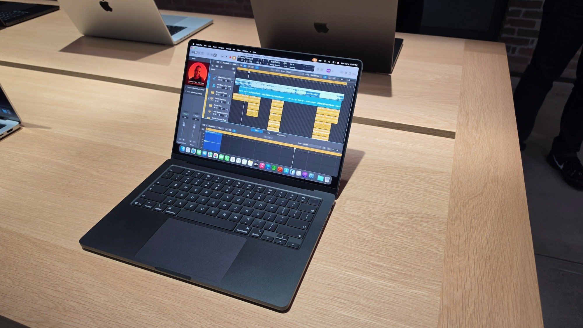 m5 macbook pro on display with music editing software on screen