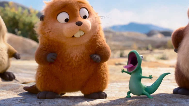 Mabel next to Tom Lizard with his mouth wide open in Hoppers