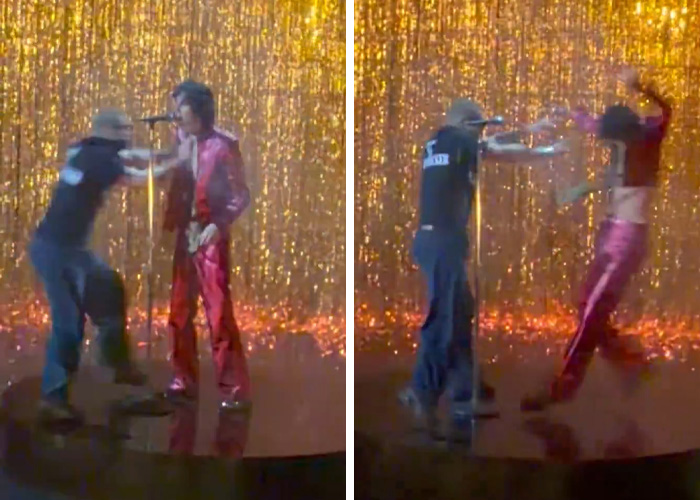 Security pushing singer off stage during chaotic moment at Brit Awards performance captured in viral video. Security pushing singer off stage during chaotic moment at Brit Awards performance captured in viral video.
