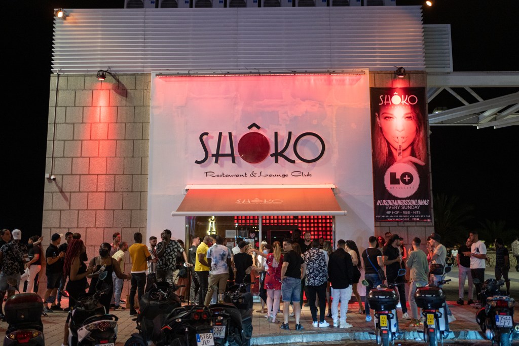 Young people queue to enter the Shoko nightclub in Barcelona, Spain.