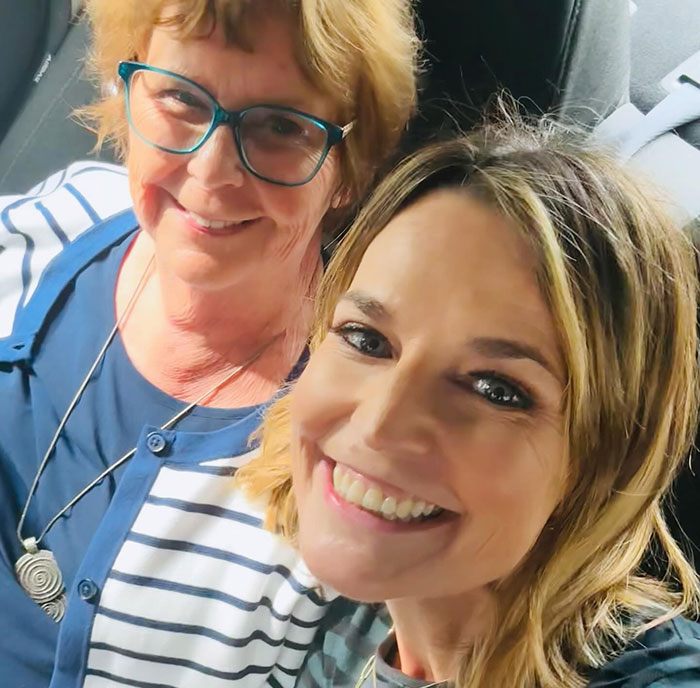 Two women smiling in a close-up selfie highlighting behind-the-scenes toxic drama amid Savannah Guthrie’s Today Show return.
