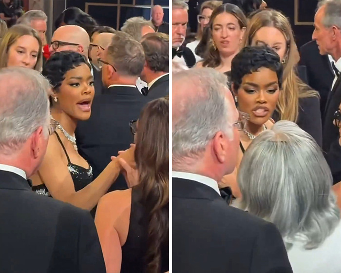 Teyana Taylor engaged in a heated exchange with a security guard amid a crowded Oscars event with onlookers present.
