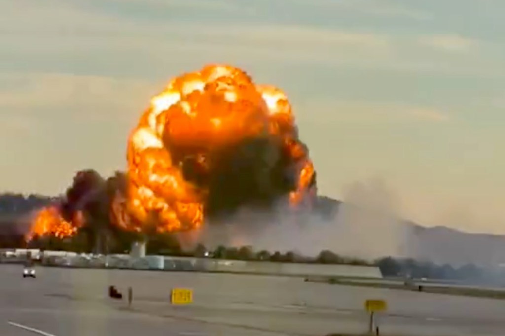 Explosion and fire from a crashed plane near Louisville Muhammad Ali International Airport.