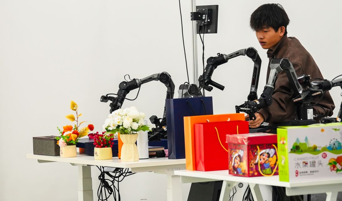 Workers are seen training humanoid robotsShot inside X-humanoid's robot training centre on the outskirts of Beijing on March 19.