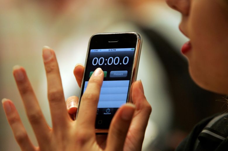 Sarah Meyers holds the new Apple iPhone June 29, 2007 in San Francisco, California.